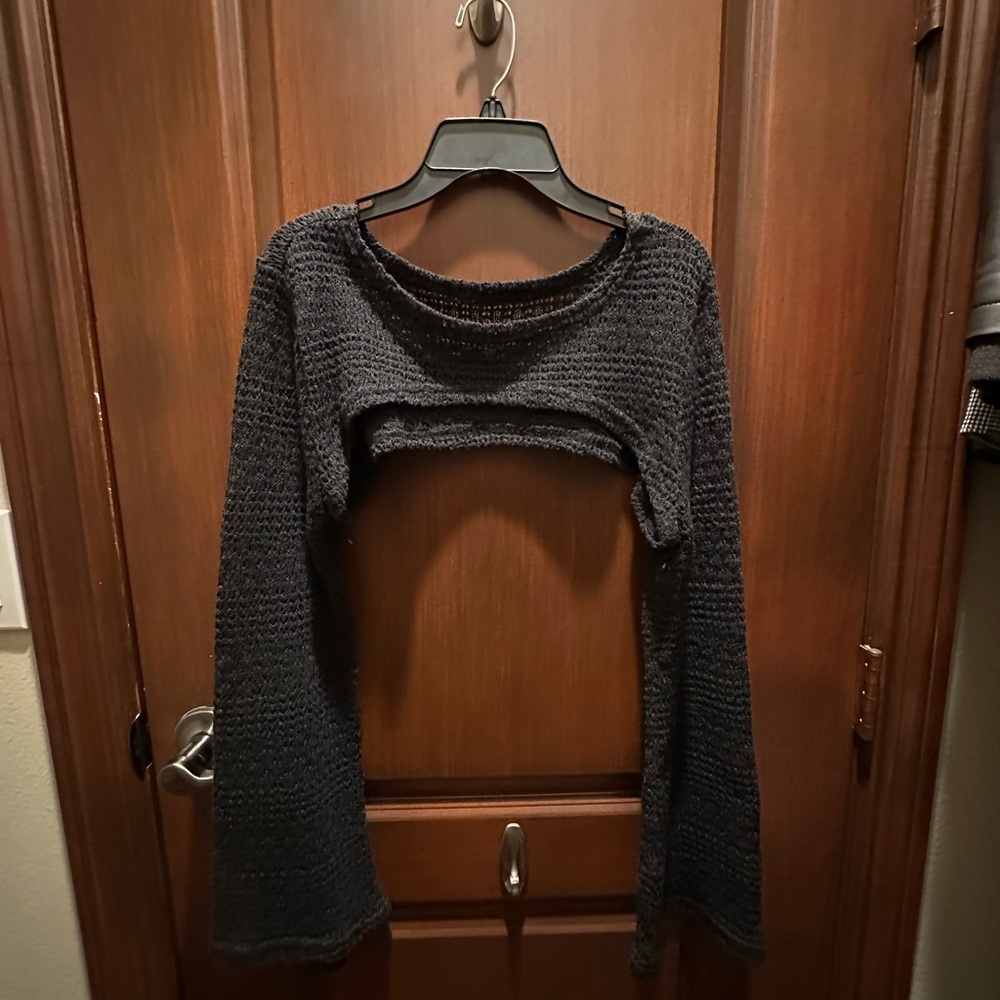 Chic Black Shrug with Soft Texture and Fringe